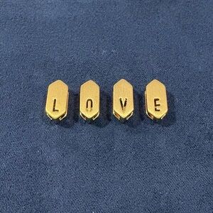 KEEP Collective gold charms